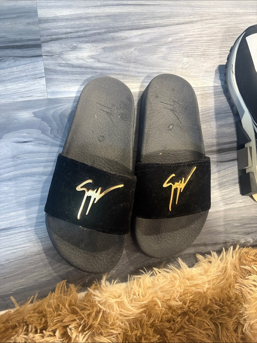 Giuseppe Zanotti Black Slide Sandals with Gold Signature